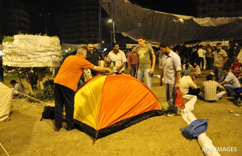 Protesters gather in Tahrir Square in Cairo in the evening hours of July 8, 2011. Tens of thousands of Egyptians packed city centres across the country on Friday, demanding faster reforms and voicing frustration at what...