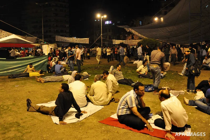 Protesters gather in Tahrir Square in Cairo in the evening hours of July 8, 2011. Tens of thousands of Egyptians packed city centres across the country on Friday, demanding faster reforms and voicing frustration at what...