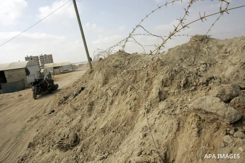 Palestinian Hamas security forces put barbed wire at the Egyptian border with the Gaza Strip in the city of Rafah, southern Gaza Strip on July 10, 2011. Where the Palestinian Hamas security forces intensified security me...