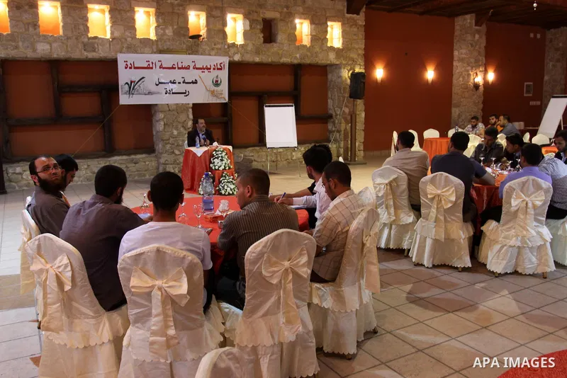 Palestinian Minister of Economy delivers speech during a meeting in Gaza city on July 10, 2011. Photo by Mohammed Asad