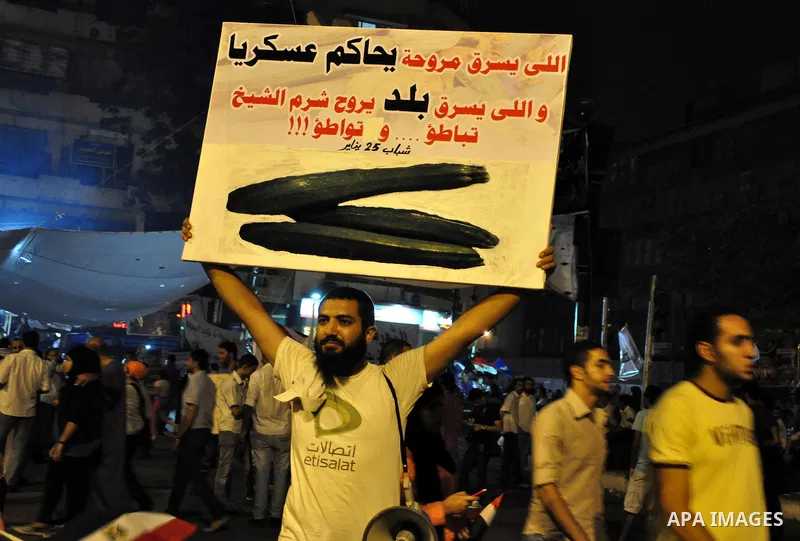 Hundreds of demonstrators gather as they spend their second night in Cairo's Tahrir Square, on July 10, 2011, at the landmark square vowing to keep up their sit-in despite a series of concessions by the Egyptian prime mi...