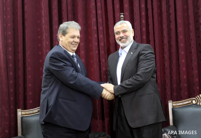 Palestinian Prime Minister in Gaza Strip, Ismail Haniya meets with senior Fatah official, Rouhi Fatoh at his office in Gaza City on July 11, 2010. Fatoh, a leader of Palestinian President Mahmoud Abbas's Fatah group, tra...