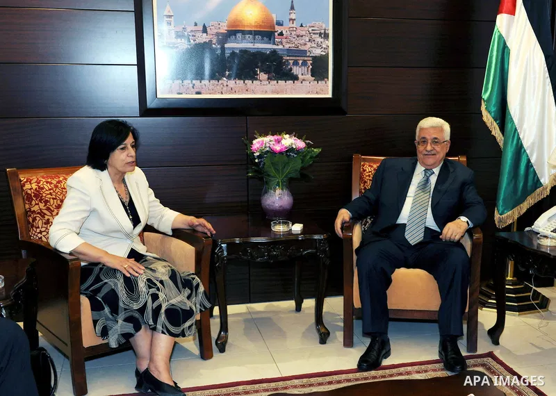 Palestinian President Mahmoud Abbas (Abu Mazen) meets with the Secretary-general of Fida Party, Zahira Kamal in the West Bank city of Ramallah on July 11,2011. Photo by Mufeed Abu Hasnah