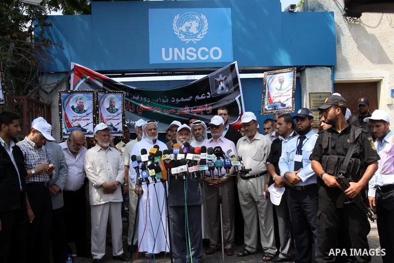 Palestinian Hamas legislators deliver speech during a protest in front of UNRWA headquarters in Gaza city on July 12, 2011 in support with Jerusalem's parliament members who have been living inside the ICRC compound in J...