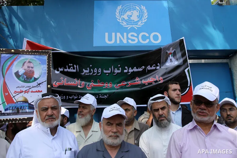 Palestinian Hamas legislators take part in a protest in front of UNRWA headquarters in Gaza city on July 12, 2011 in support with Jerusalem's parliament members who have been living inside the ICRC compound in Jerusalem...