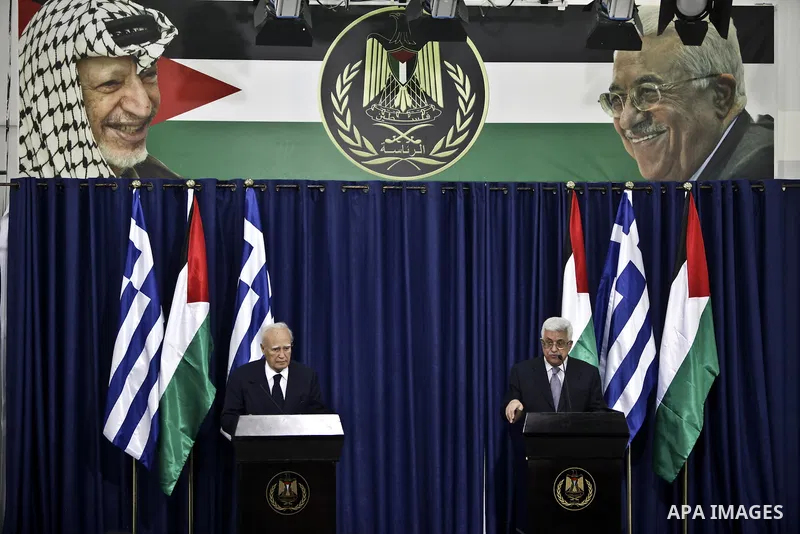 Palestinian president Mahmoud Abbas (Abu Mazen) and Greek President Karolos Papoulias give a press conference in the West Bank city of Ramallah on July 12, 2011 during an official visit by the latest to the Palestinian t...