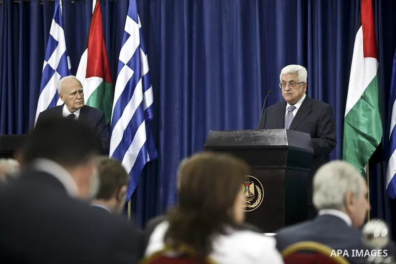 Palestinian president Mahmoud Abbas (Abu Mazen) and Greek President Karolos Papoulias give a press conference in the West Bank city of Ramallah on July 12, 2011 during an official visit by the latest to the Palestinian t...