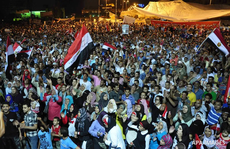 Egyptians are gathered at one of the Tharir square entrances where a sit-in is taking place, Cairo, Egypt, 12 July 2011. Egypt's military rulers on 12 July warned protesters against "harming public interests" after they...