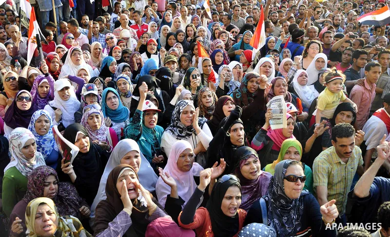 Egyptians are gathered at one of the Tharir square entrances where a sit-in is taking place, Cairo, Egypt, 12 July 2011. Egypt's military rulers on 12 July warned protesters against "harming public interests" after they...