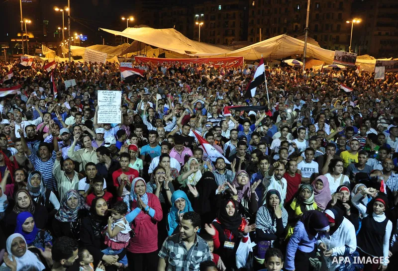 Egyptians are gathered at one of the Tharir square entrances where a sit-in is taking place, Cairo, Egypt, 12 July 2011. Egypt's military rulers on 12 July warned protesters against "harming public interests" after they...