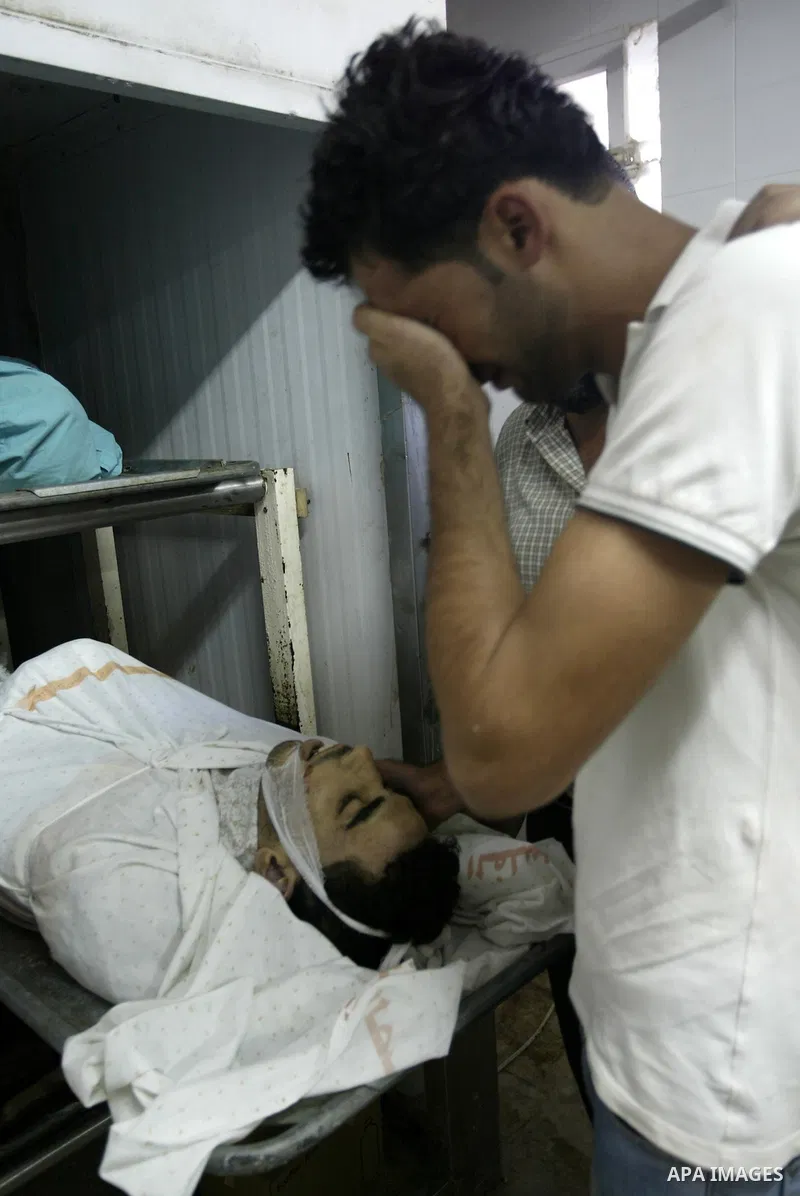 Palestinian Relatives identify the body of 21 year-old Ibrahim Sarhan, who was shot dead during an Israeli raid on the West Bank refugee camp Al-Fara, north of Nablus on July 13, 2011. Photo by Wagdi Eshtayah