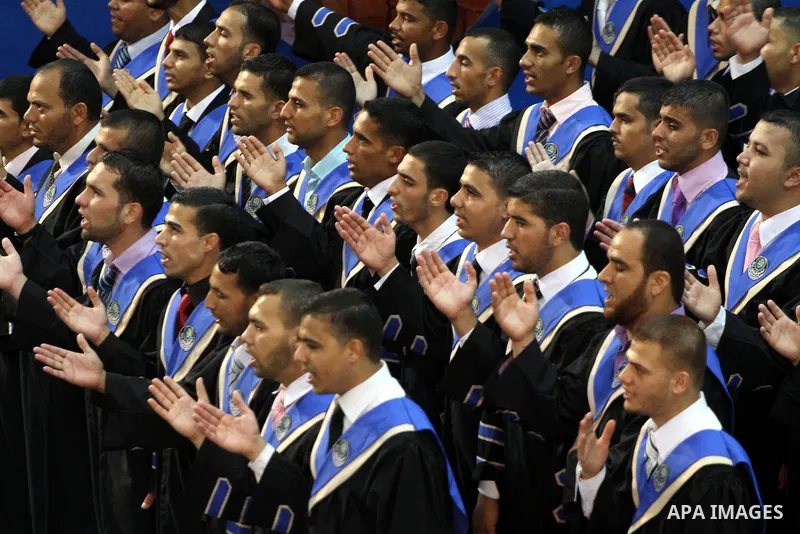 Palestinian students participate in their graduation ceremony at the Islamic University in Gaza city on July 13, 2011. Photo by Mohammed Asad