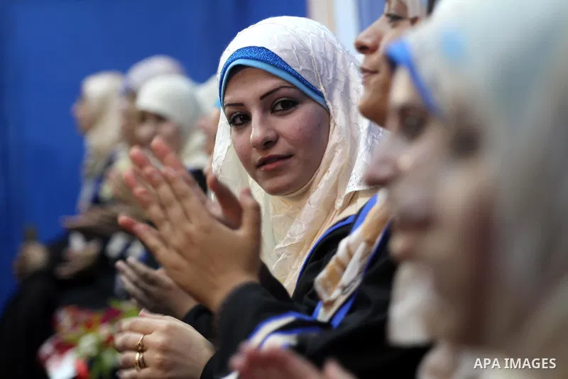 Palestinian students participate in their graduation ceremony at the Islamic University in Gaza city on July 13, 2011. Photo by Mohammed Asad