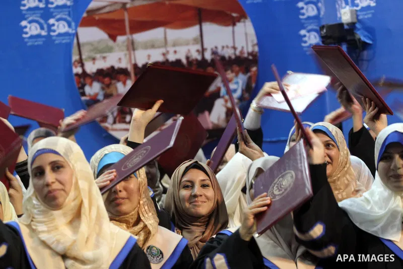 Palestinian students participate in their graduation ceremony at the Islamic University in Gaza city on July 13, 2011. Photo by Mohammed Asad