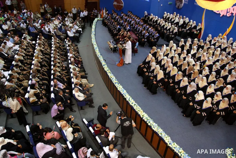 Palestinian students participate in their graduation ceremony at the Islamic University in Gaza city on July 13, 2011. Photo by Mohammed Asad