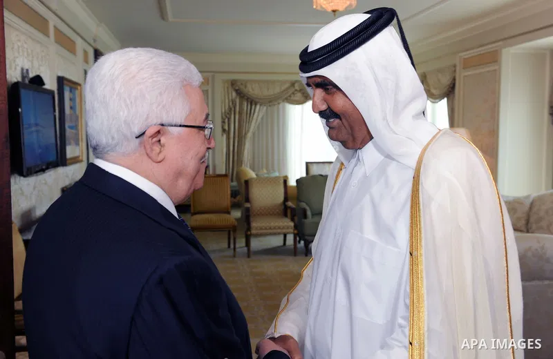 Palestinian President Mahmoud Abbas (Abu Mazen) during a meeting with the Emir of Qatar, Sheikh Hamad bin Khalifa al-Thani in Doha on July14, 2011 . Photo by Thaer Ganaim