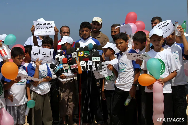 Children of Palestinian prisoners deliver speech in a protest calling Israel to allow residents of Gaza to visit their relatives imprisoned in Israel, on July 14, 2011 in Gaza City. Israel stopped allowing Palestinians f...