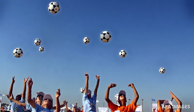 Palestinian children play with balls during summer camp activities supervised by the UN Relief and Works Agency (UNRWA) in Rafah in the southern Gaza Strip on July 14, 2011. Photo by Ali Jadallh