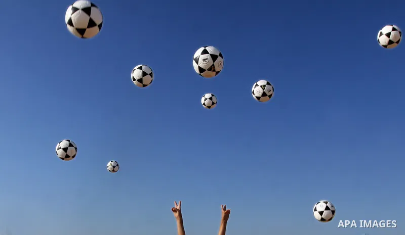 Palestinian children play with balls during summer camp activities supervised by the UN Relief and Works Agency (UNRWA) in Rafah in the southern Gaza Strip on July 14, 2011. Photo by Ali Jadallh