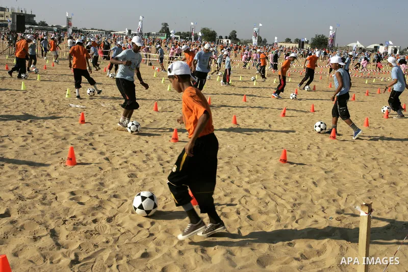 Palestinian children play with balls during summer camp activities supervised by the UN Relief and Works Agency (UNRWA) in Rafah in the southern Gaza Strip on July 14, 2011. Photo by Abed Rahim Khatib