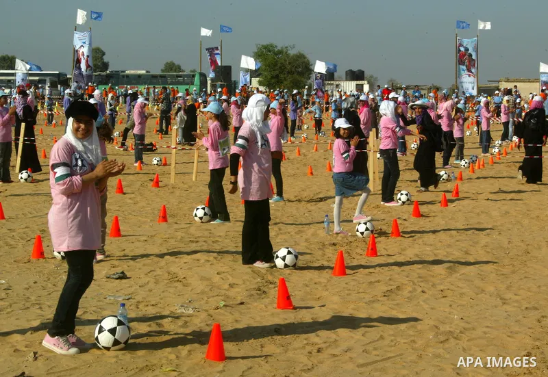 Palestinian children play with balls during summer camp activities supervised by the UN Relief and Works Agency (UNRWA) in Rafah in the southern Gaza Strip on July 14, 2011. Photo by Abed Rahim Khatib