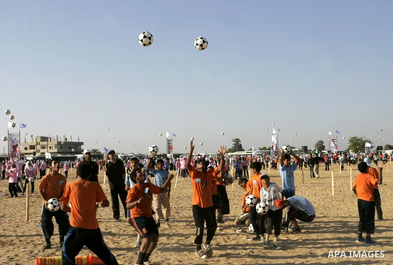 Palestinian children play with balls during summer camp activities supervised by the UN Relief and Works Agency (UNRWA) in Rafah in the southern Gaza Strip on July 14, 2011. Photo by Abed Rahim Khatib