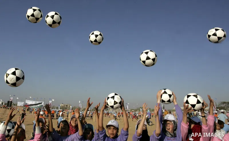 Palestinian children play with balls during summer camp activities supervised by the UN Relief and Works Agency (UNRWA) in Rafah in the southern Gaza Strip on July 14, 2011. Photo by Abed Rahim Khatib
