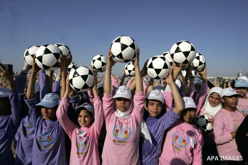 Palestinian children play with balls during summer camp activities supervised by the UN Relief and Works Agency (UNRWA) in Rafah in the southern Gaza Strip on July 14, 2011. Photo by Abed Rahim Khatib