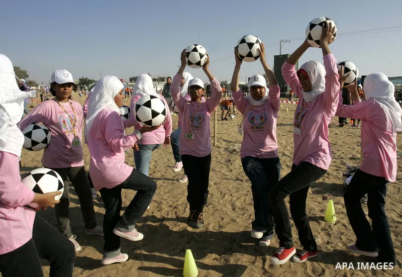 Palestinian children play with balls during summer camp activities supervised by the UN Relief and Works Agency (UNRWA) in Rafah in the southern Gaza Strip on July 14, 2011. Photo by Abed Rahim Khatib