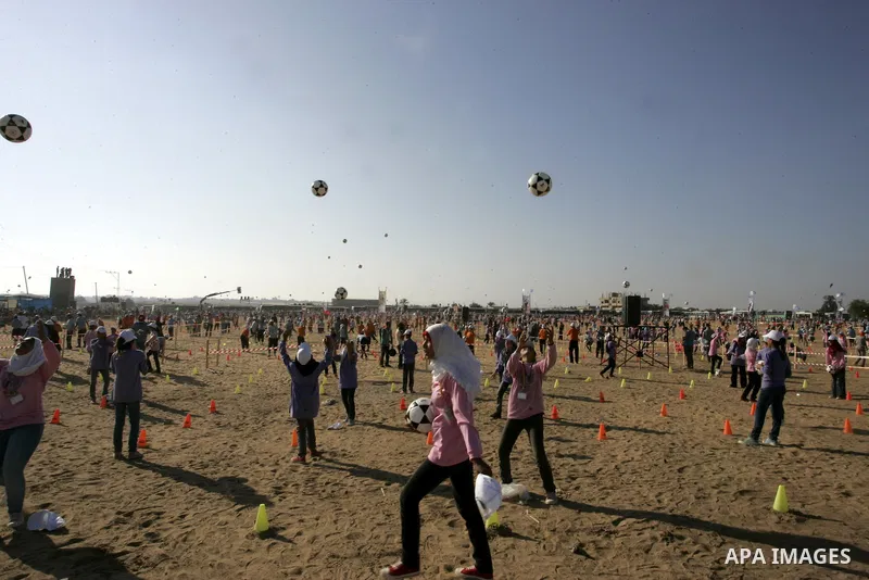 Palestinian children play with balls during summer camp activities supervised by the UN Relief and Works Agency (UNRWA) in Rafah in the southern Gaza Strip on July 14, 2011. Photo by Abed Rahim Khatib