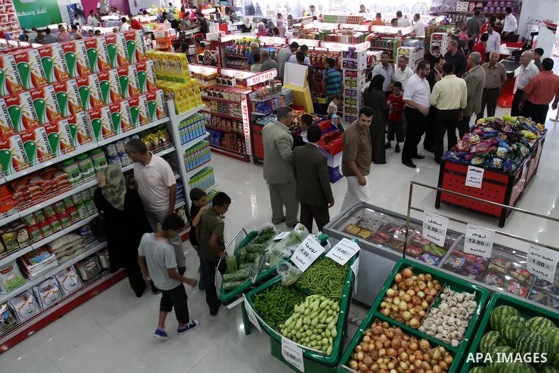 Palestinians shop from the newly opened shopping mall in Gaza City on July 14, 2011. Photo by Mohammed Asad