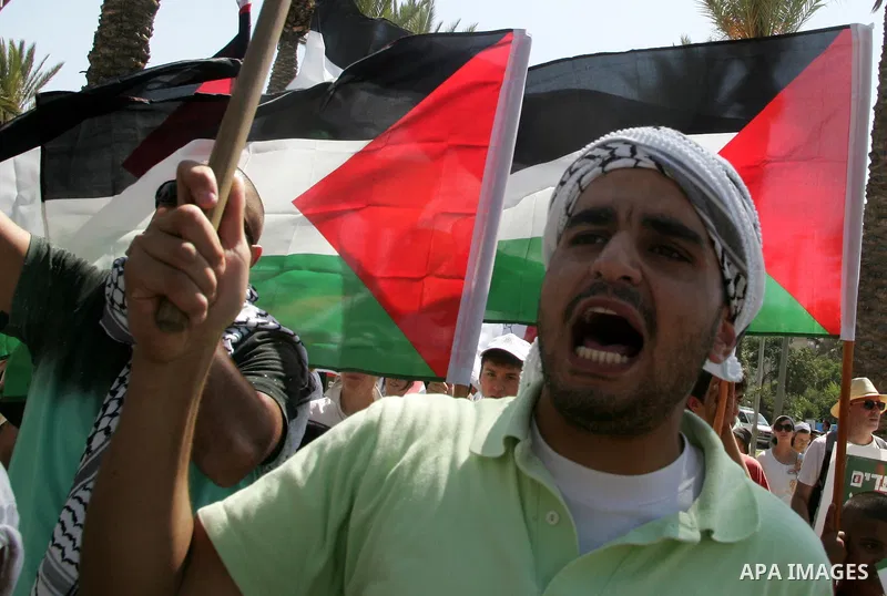 Israeli, Palestinian and foreign activists march calling for an independent Palestinian state on July 15, 2011. Some 1,000 Israelis and Palestinians gathered in east Jerusalem for a protest march to support the Palestini...