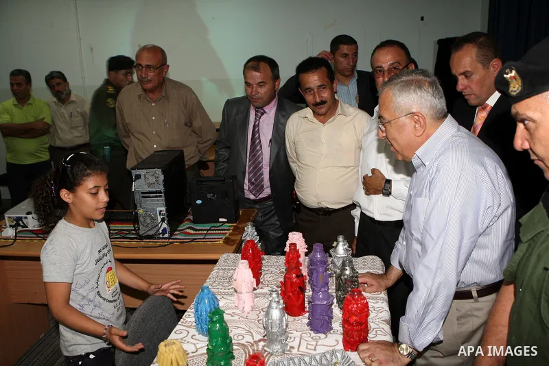 Palestinian Prime Minister, Salam Fayyad visits the summer camp "Palestine in the eyes of martyrs' sons" in al-Fara'a refugee camp in the West Bank on July 16, 2011. Photo by Mustafa Abu Dayeh