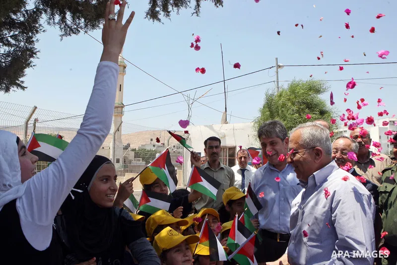 Palestinian Prime Minister, Salam Fayyad visits the summer camp "Palestine in the eyes of martyrs' sons" in al-Fara'a refugee camp in the West Bank on July 16, 2011. Photo by Mustafa Abu Dayeh