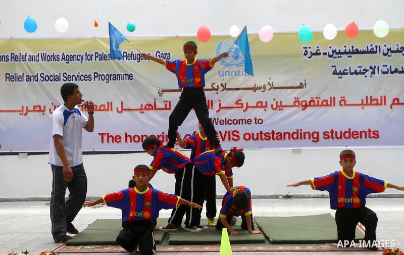 Palestinian talented students with disabilities visual attend a ceremony in the rehabilitation Centre for Visually Impaired in Gaza city on July 17, 2011. Photo by Ashraf Amra