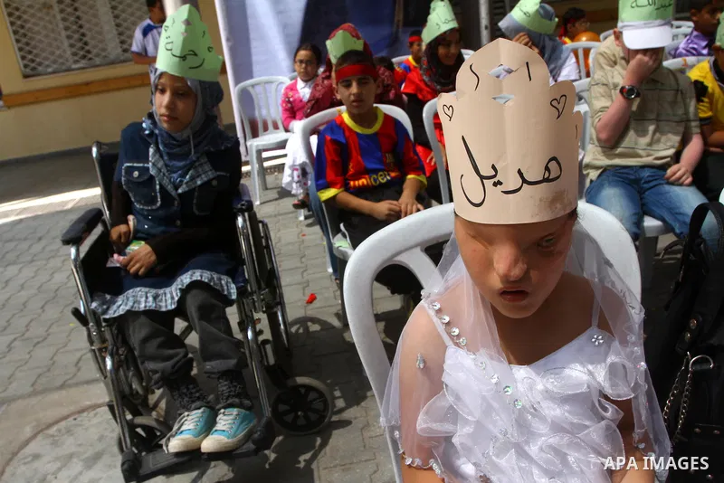 Palestinian talented students with disabilities visual attend a ceremony in the rehabilitation Centre for Visually Impaired in Gaza city on July 17, 2011. Photo by Ashraf Amra