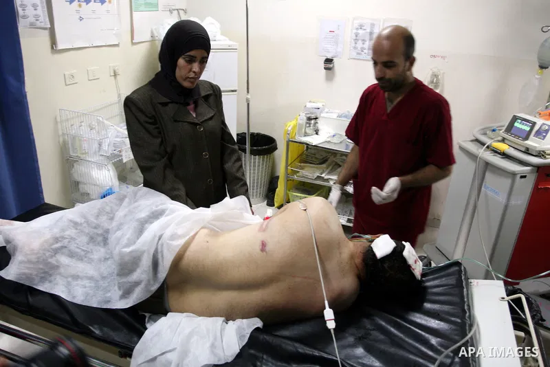 Palestinian man Ahmed Abu Alia 43, From the village of Michmas in Ramallah in the West bank, recieves medical treatment at a hospital in Ramallah on on July 18, 2011. Abu Alia was apparnetly attacked by Jewish settlers f...