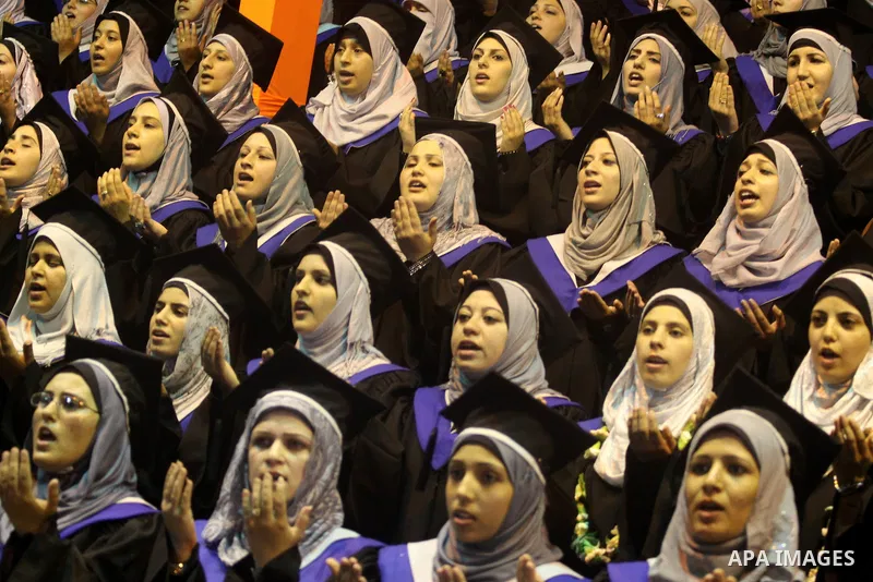 Palestinian students participate in their graduation ceremony at the University College of Applied Sciences in Gaza city on July18, 2011. Photo by Mohammed Asad