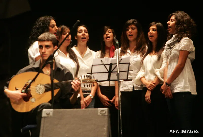 Palestinians perform during a musical concert at Al-Hakawati theatre in Jerusalem on July 19,2011. Photo by Mahfouz Abu Turk