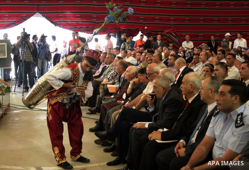 Palestinian prime minister Salam Fayyad participates in the International Conference to develop the centers of the historical cities and develop their economical situation, in the West Bank city of Hebron on July 19,2011...