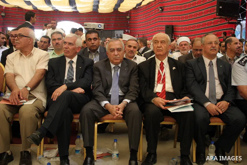 Palestinian prime minister Salam Fayyad participates in the International Conference to develop the centers of the historical cities and develop their economical situation, in the West Bank city of Hebron on July 19,2011...