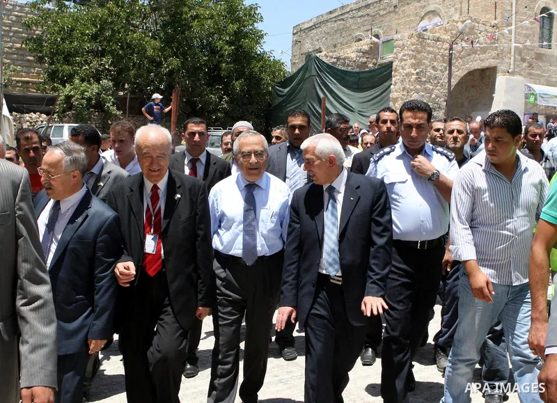Palestinian prime minister Salam Fayyad participates in the International Conference to develop the centers of the historical cities and develop their economical situation, in the West Bank city of Hebron on July 19,2011...