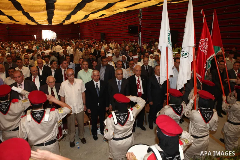 Palestinian prime minister Salam Fayyad participates in the International Conference to develop the centers of the historical cities and develop their economical situation, in the West Bank city of Hebron on July 19,2011...
