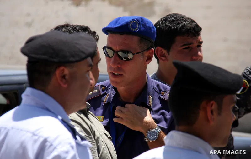An EU policeman trains Palestinian policemen to organise the traffic in the West Bank city of Salfit on July 20,2011. . Photo by Wagdi Eshtayah