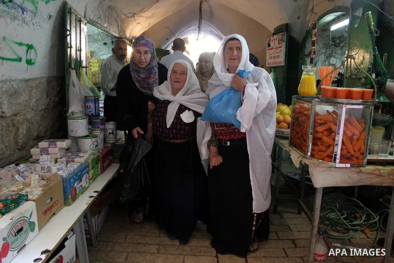 Palestinians enjoy the restoration places in the old city of Hebron on July 20,2011, as Palestinians participate in the second day of the International Conference to develop the centers of the historical cities and devel...