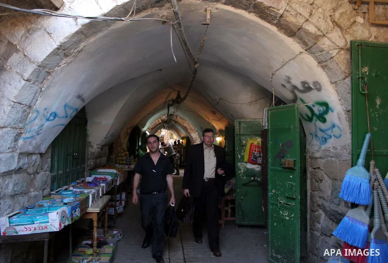 Palestinians enjoy the restoration places in the old city of Hebron on July 20,2011, as Palestinians participate in the second day of the International Conference to develop the centers of the historical cities and devel...
