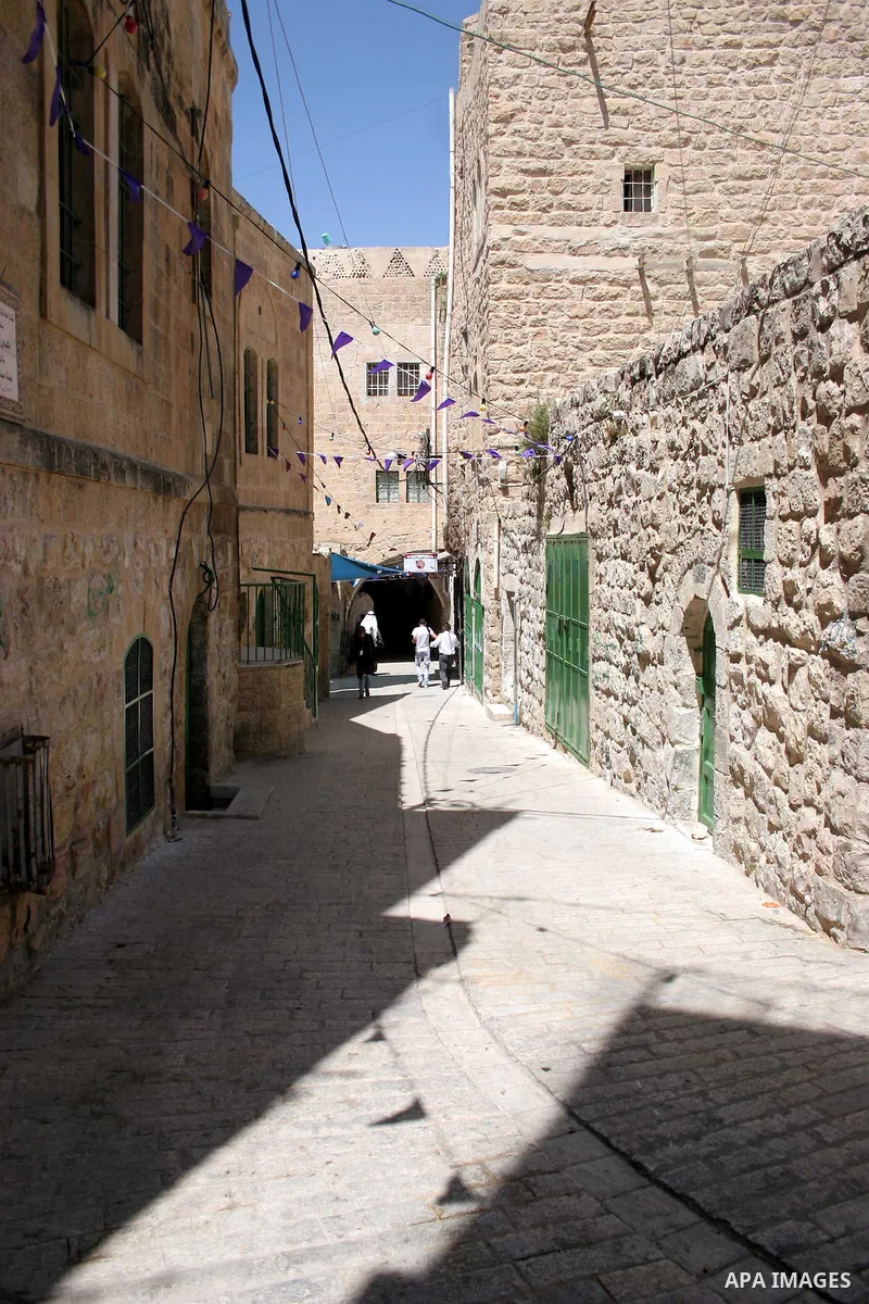 Palestinians enjoy the restoration places in the old city of Hebron on July 20,2011, as Palestinians participate in the second day of the International Conference to develop the centers of the historical cities and devel...