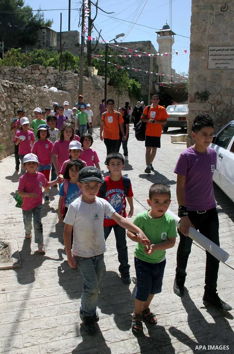 Palestinians enjoy the restoration places in the old city of Hebron on July 20,2011, as Palestinians participate in the second day of the International Conference to develop the centers of the historical cities and devel...