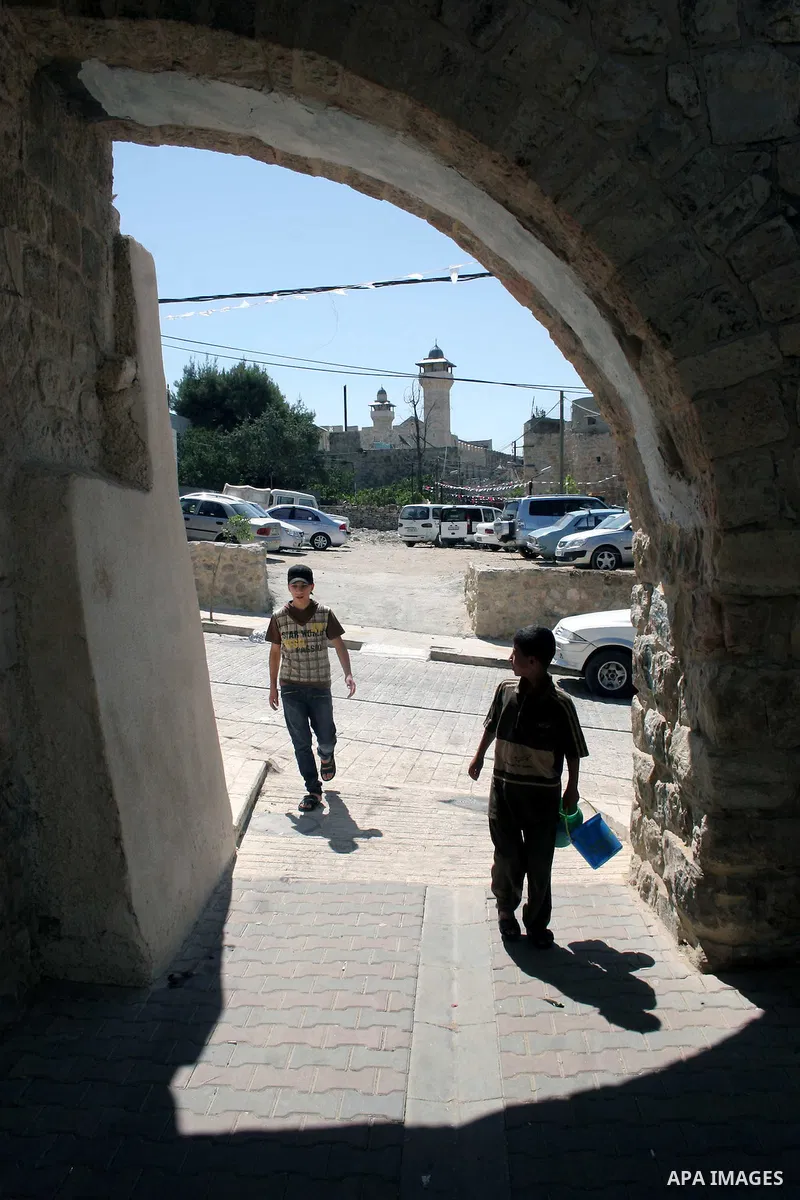 Palestinians enjoy the restoration places in the old city of Hebron on July 20,2011, as Palestinians participate in the second day of the International Conference to develop the centers of the historical cities and devel...
