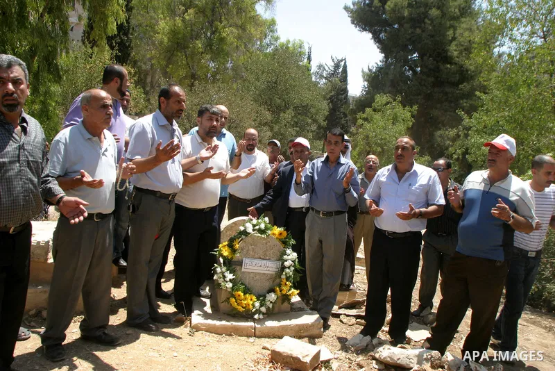 Palestinians take a part in a protest to the Israeli violations of the Islamic sanctities in Jerusalem on July 21, 2011. where washed away and destroyed lately about 100 grave in "Maaman allah" the historic Islamic grave...